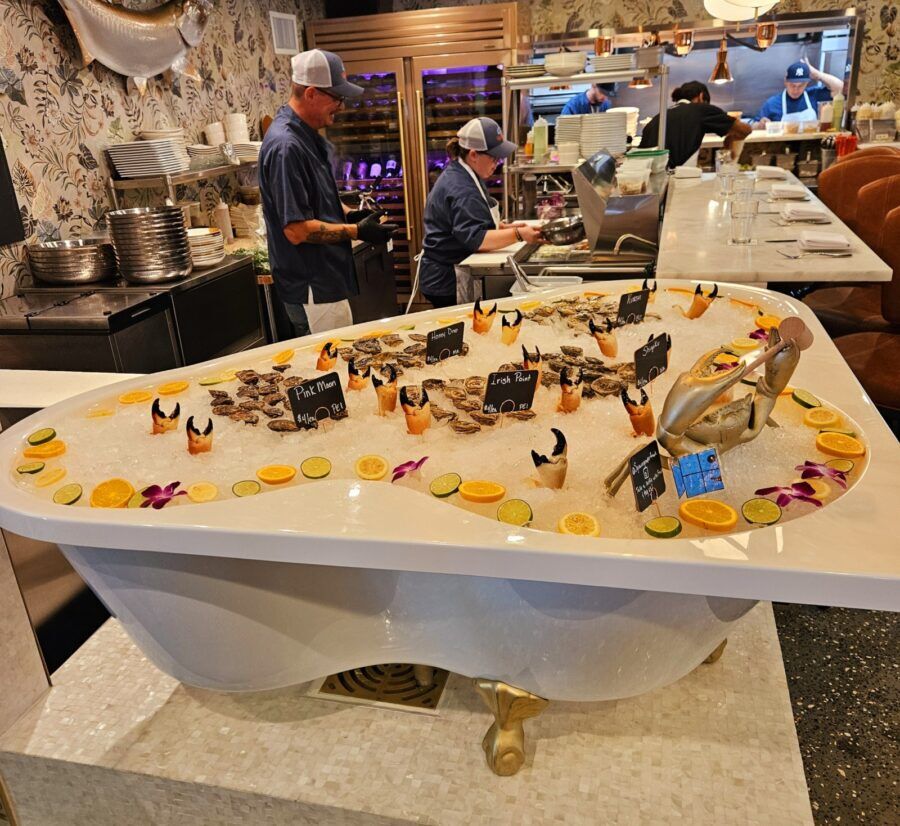 a counter with a cake on it in a restaurant