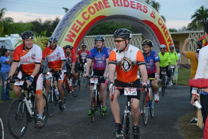 tbh_7770 #News: Annual “SMART Ride” may cause traffic slow downs - A group of people riding on the back of a bicycle - Road Bike