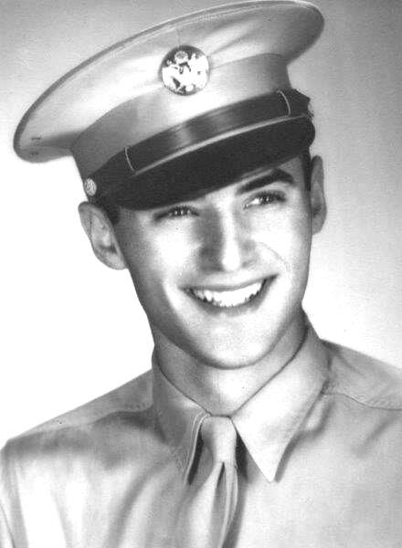 Living history comes to Key West High School - A young man wearing a hat posing for the camera - KEY WEST HIGH SCHOOL