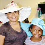 ‘Talk Derby to Me’ - A person wearing a hat and smiling at the camera - Sun hat