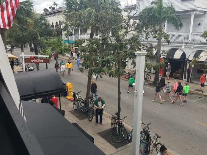 Gas Monkey Bar N’ Grill serves up music and more - A group of people walking down the street - Gas Monkey Bar N' Grill