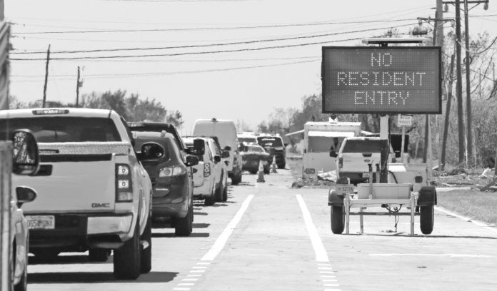 Hurricane Irma Re-entry revamp – BOCC: Post-Irma rules were ‘ineffective’ - A truck that is driving down the street - Hurricane Irma
