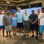 25 Disabled Veterans Are Honored - Roland Nilsson et al. standing in front of a crowd posing for the camera - Islamorada