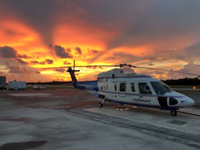 1018Trauma Star at Marathon hangar Saving Lives in the Keys – Trauma Star’s Stats Excel - A small airplane sitting on the tarmac at sunset - Florida Keys