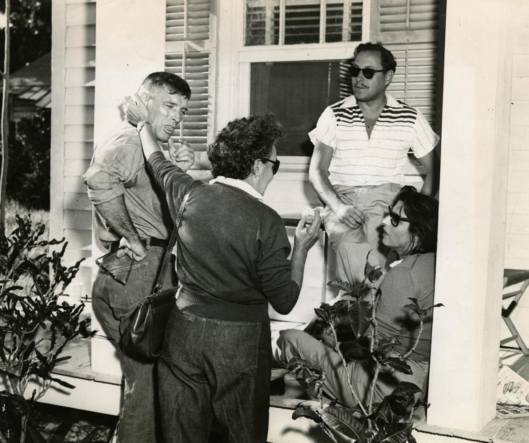 Tennessee Williams Celebrating Tennessee Williams: Events will Offer Cocktails, Movies, Books and More! - Tennessee Williams et al. standing in front of a building - Tennessee Williams