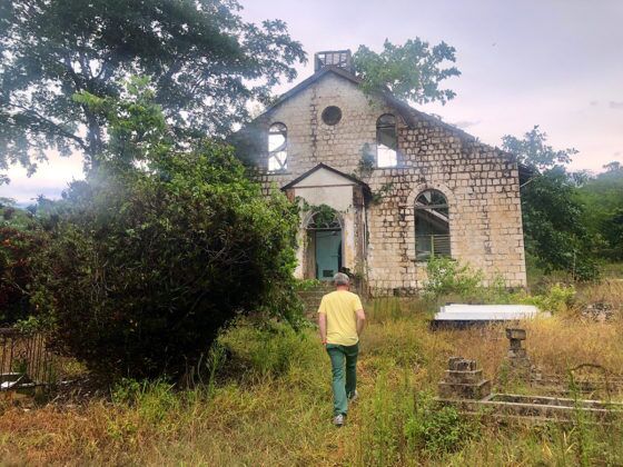 Jamaica in 24 Hours: An island adventure in a day - A man standing in front of a house - Jamaica