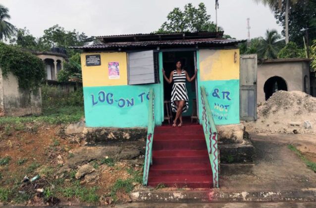 Jamaica in 24 Hours: An island adventure in a day - A house that has a sign on the side of a building - Trench Town