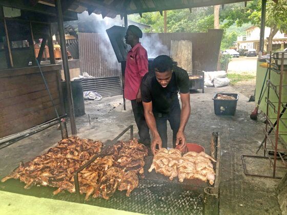 Jamaica in 24 Hours: An island adventure in a day - A man that is cooking some food - Churrasco
