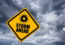 Preparing And Protecting Kids During Hurricane Season - A close up of a stop sign on a pole - 2019 Atlantic hurricane season