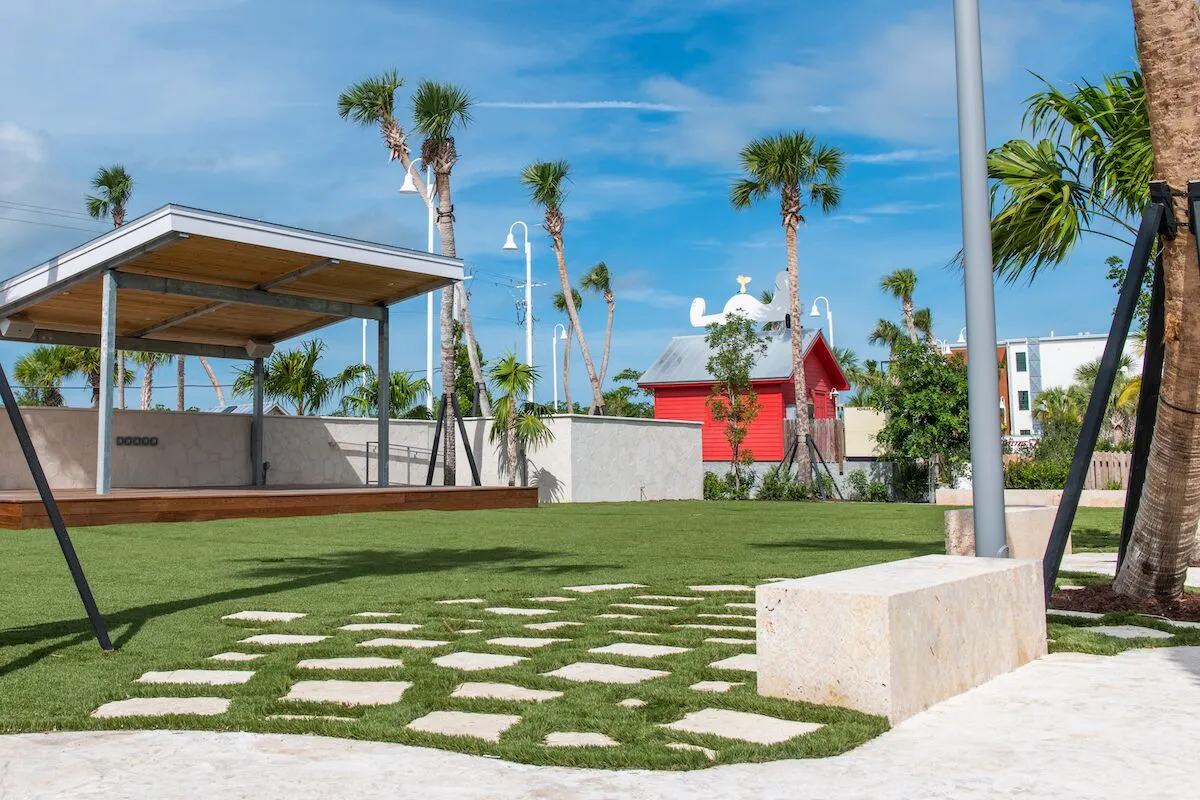It takes a village… - A large lawn in front of a building - The Perry Hotel Key West