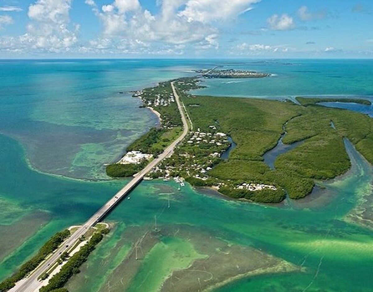 Municipalities proactive on flooding, sea level rise - A body of water next to the ocean - Florida Keys