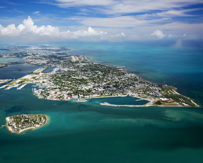 Municipalities proactive on flooding, sea level rise - A view of a body of water with a mountain in the ocean - Islet