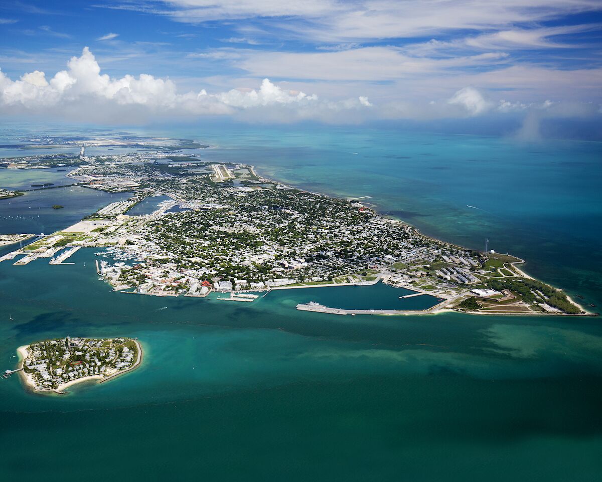 Municipalities proactive on flooding, sea level rise - A view of a body of water with a mountain in the ocean - Islet