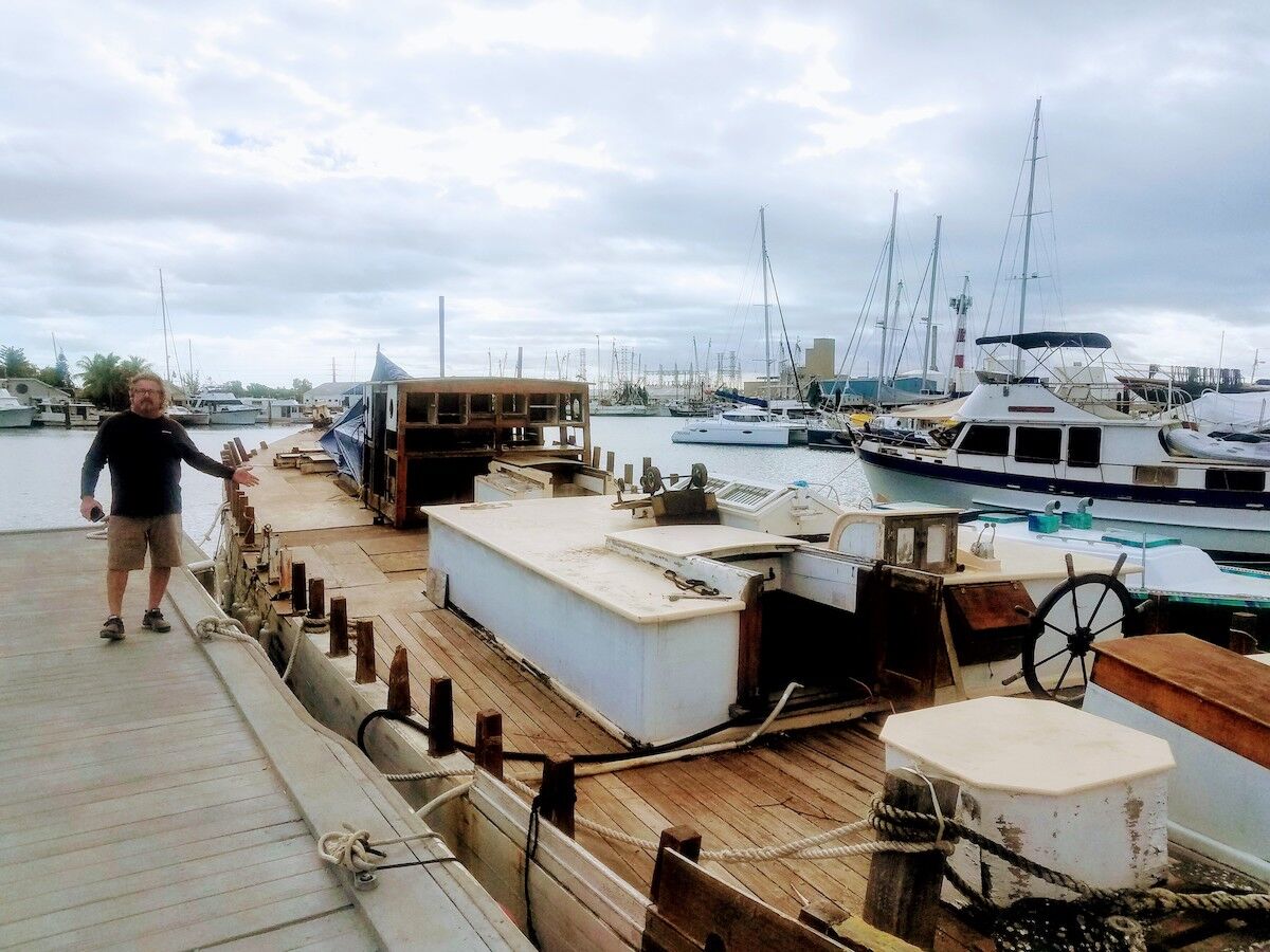 Saving a schooner – Historic flagship limps home to Key West - A boat docked at a dock - Boat