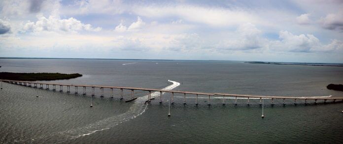 Card-Sound-Bridge_pano-1 a large bridge spanning over a large body of water