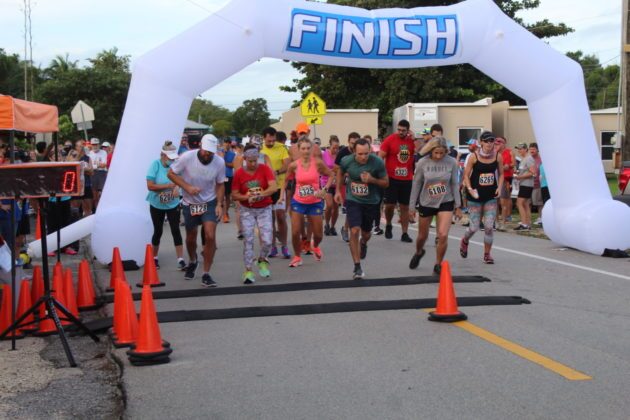 a group of people that are running in a race