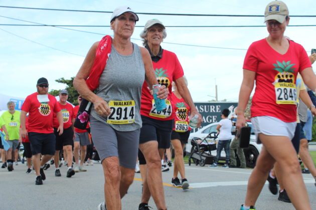 a group of people that are running in a race