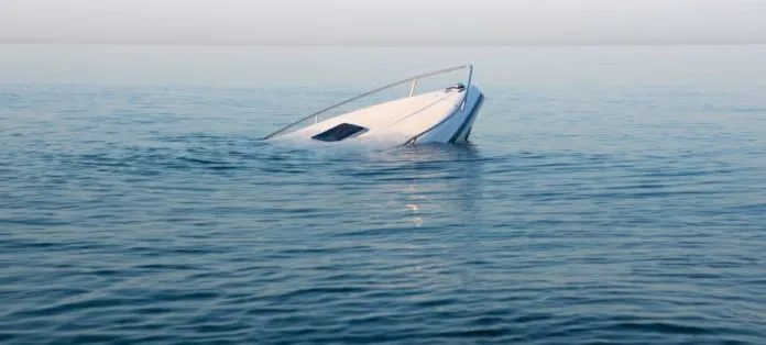 a boat in the middle of a body of water