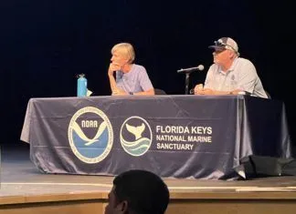 MARINE SANCTUARY: KEY WEST WATERMEN WORRY ABOUT WATER QUALITY & LAW ENFORCEMENT three people sitting at a table with microphones