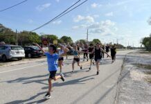 PASCAL’S WAY 5K SET FOR MAY 2 IN ISLAMORADA a group of people running down a street