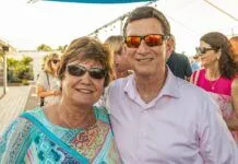 a man and a woman standing next to each other