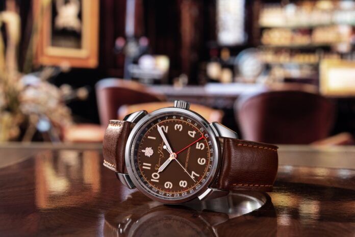 Hemingway watch Large a watch sitting on top of a wooden table