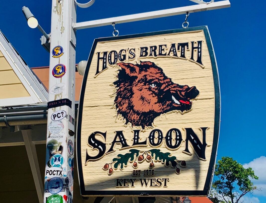 a sign for a restaurant with a bear on it