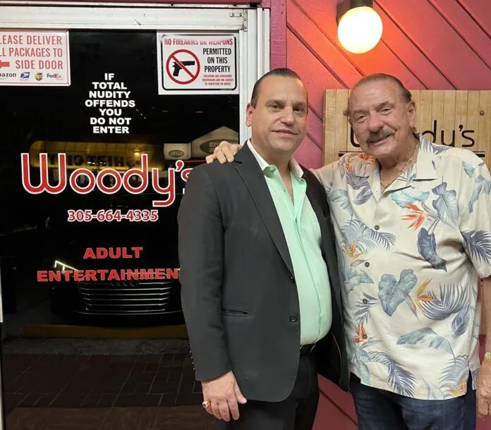 a couple of men standing next to each other