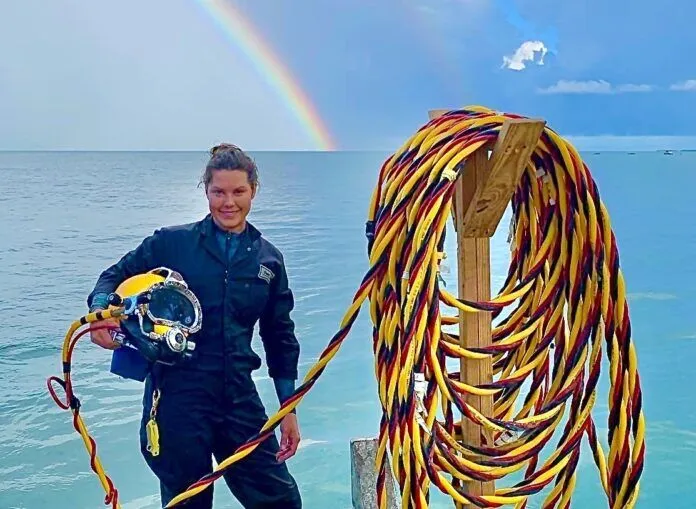 image4 Large a woman standing on a dock next to a rainbow