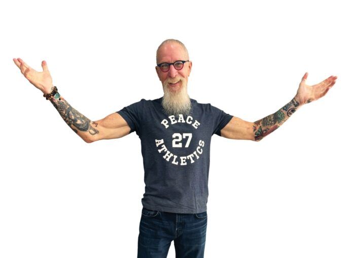 Pat Croce (1) a man with a long white beard and tattoos on his arms