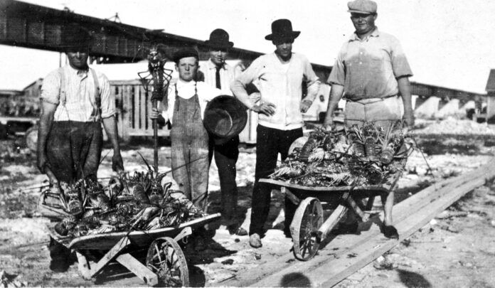 a group of men standing next to each other