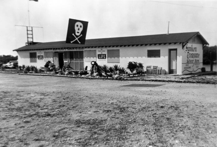McKee treasure museum a black and white photo of a building with a skull on it