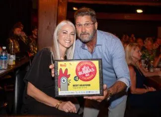 THE BUBBA AWARDS ARE BACK: NOMINATE YOUR FAVORITES MAY 30-JUNE 16 AT KEYSWEEKLY.COM a man and woman pose for a picture in a restaurant