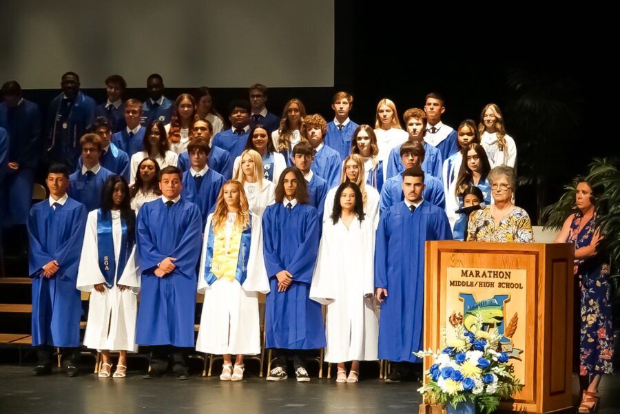 a group of people standing on a stage