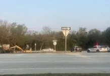 a couple of cars that are sitting in the street