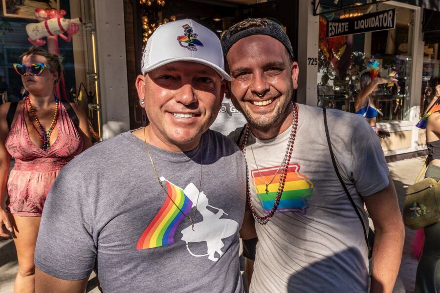 a couple of men standing next to each other
