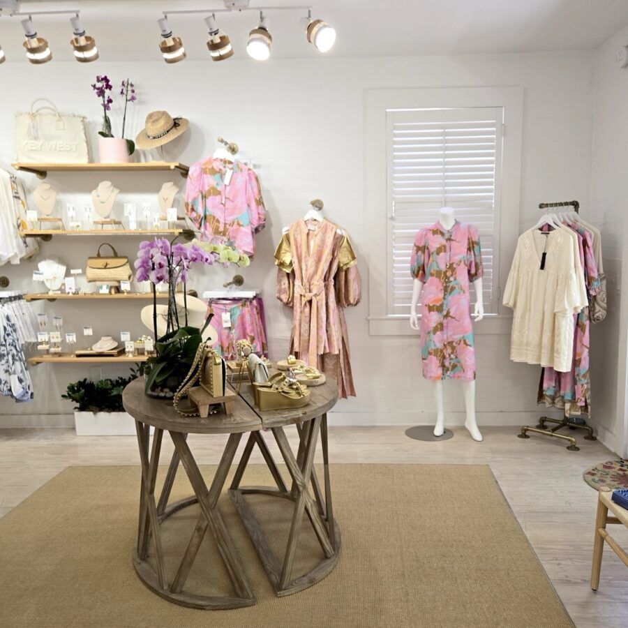 a clothing store with a lot of clothes on display