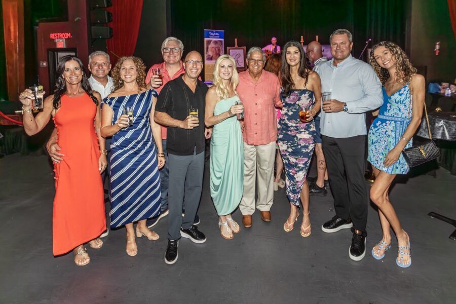 a group of people standing next to each other