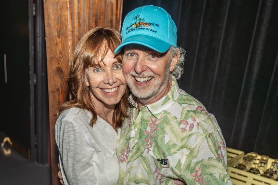 a man and a woman standing next to each other