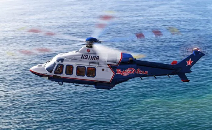 trauma star a helicopter flying over a body of water