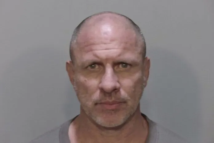 Armando Lopez 2 a mug shot of a man in a gray shirt