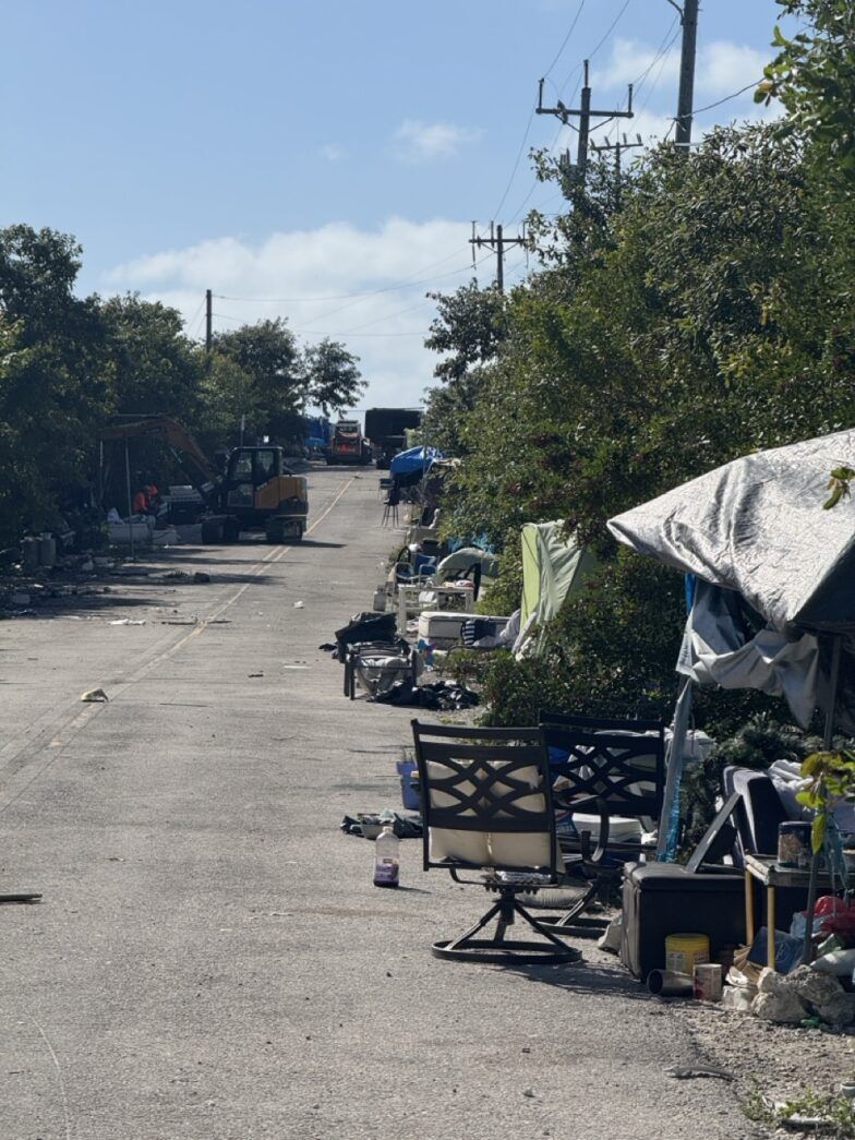 a street lined with lots of furniture and trees