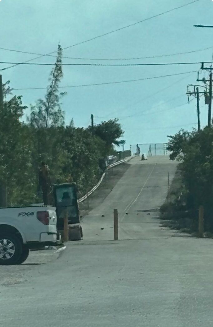 a truck is parked on the side of the road
