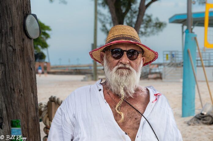 Key West Wanderings, Photos by Bill Klipp a man with a long white beard wearing a hat and sunglasses