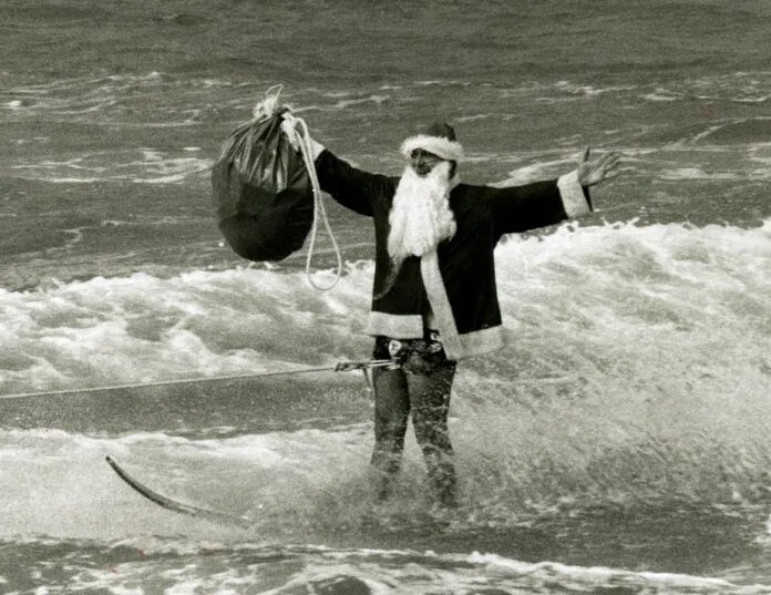 a man on a surfboard in the water
