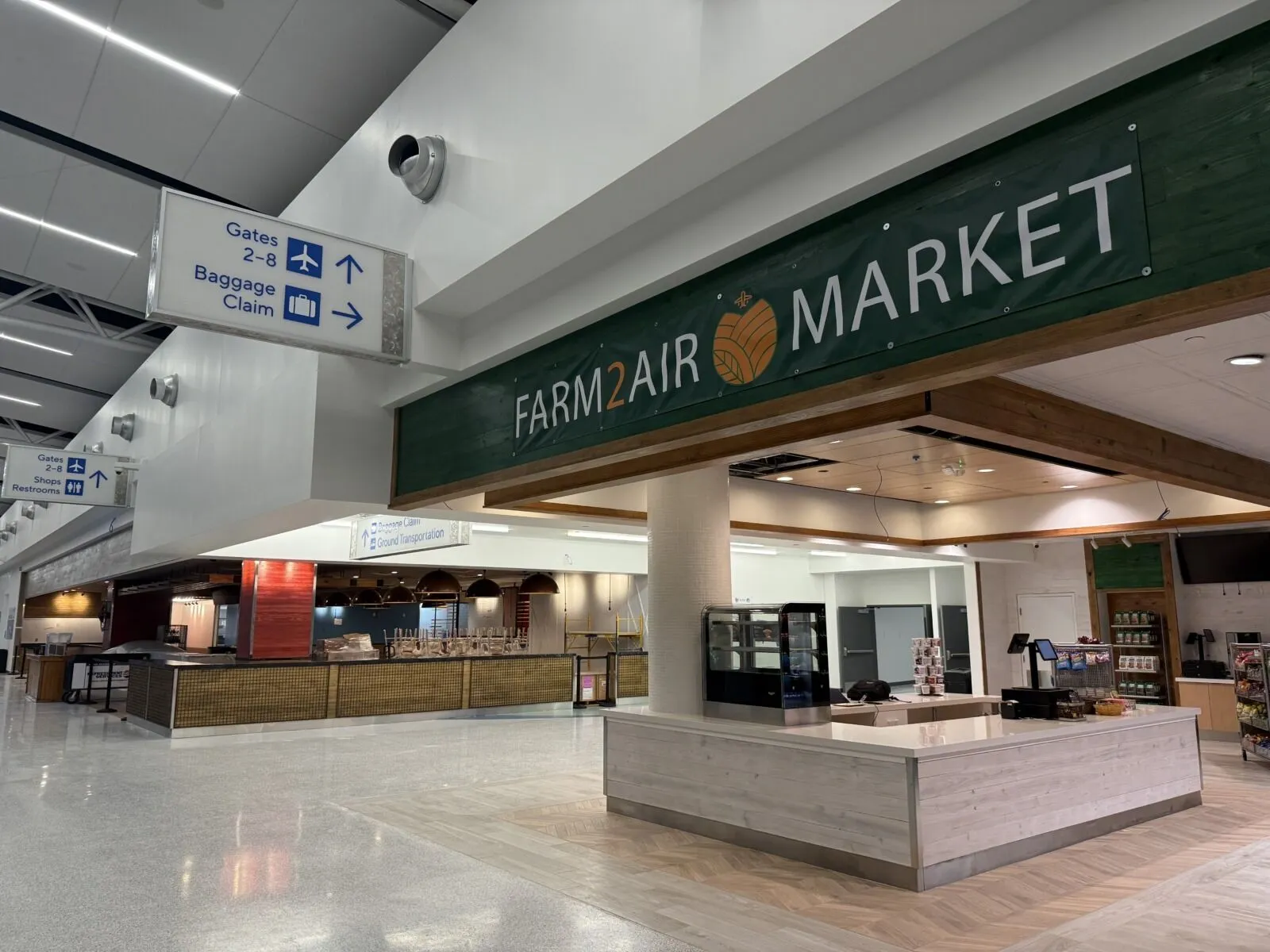 the inside of a building with a sign that says farm air market