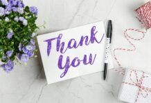 MILES TO GO: WHY WORRY? MY MOM HAS THAT COVERED A stylish thank you card paired with purple flowers, a gift box, and pen on a marble surface.