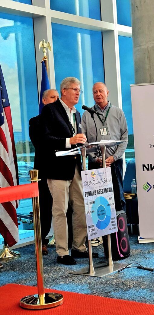 a group of people standing around a podium