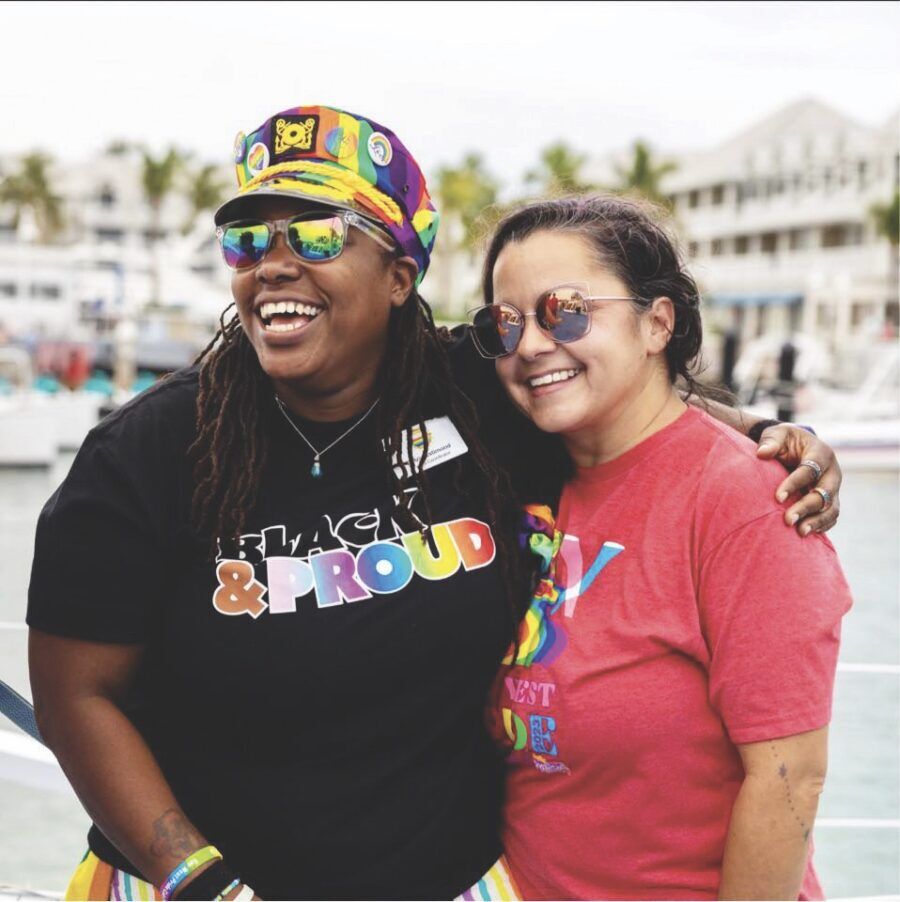 a couple of women standing next to each other
