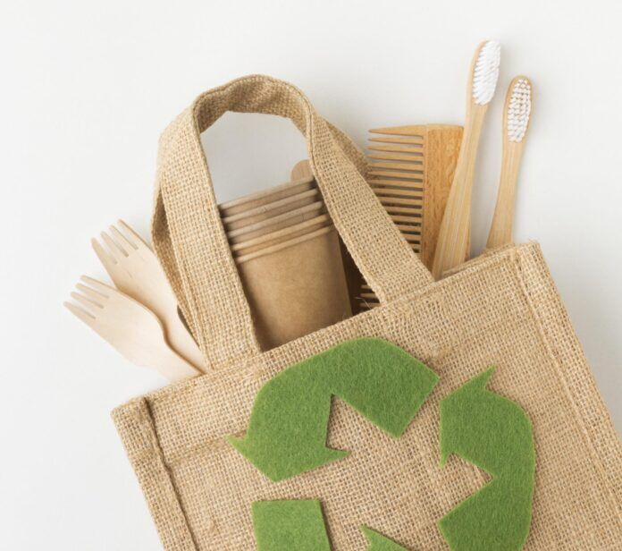 ecological-bag-desk a jute bag with a recyclable symbol on it